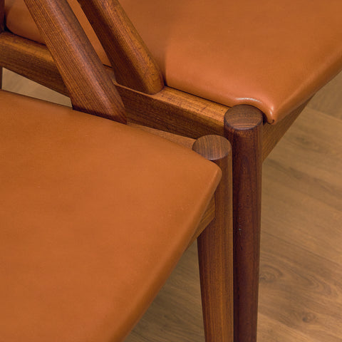Danish dining chairs in walnut by Kai Kristiansen for Schou Andersen, model 31