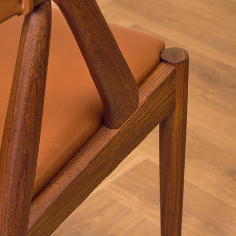 Danish dining chairs in walnut by Kai Kristiansen for Schou Andersen, model 31