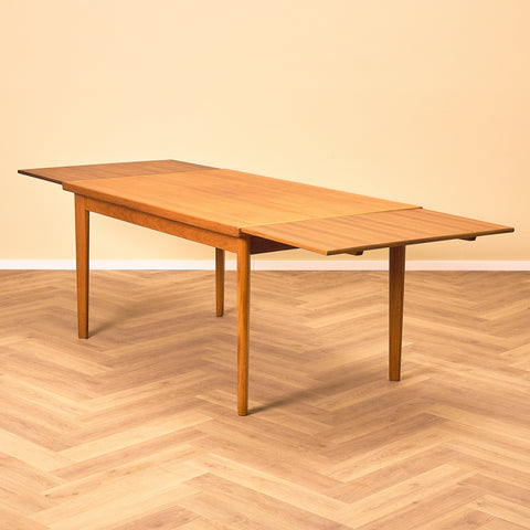 Danish dining table in teak by Henning Kjærnulf for Vejle furniture factory