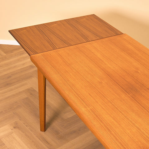 Danish dining table in teak by Henning Kjærnulf for Vejle furniture factory