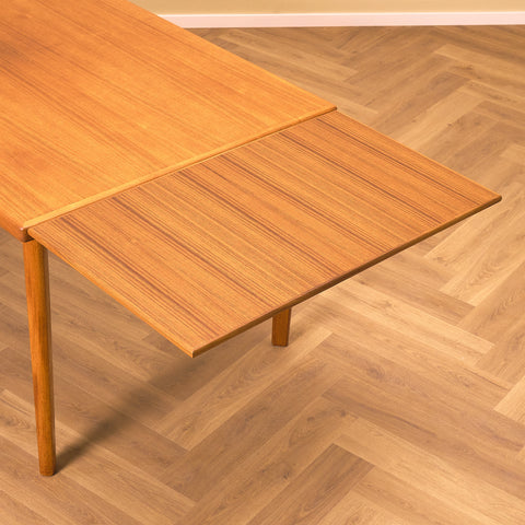 Danish dining table in teak by Henning Kjærnulf for Vejle furniture factory