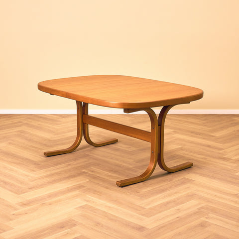 Swedish oval dining table in teak