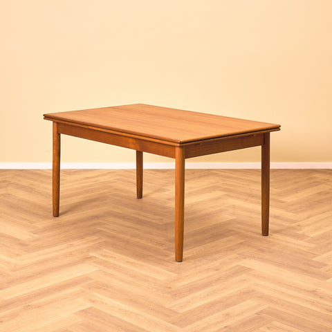 Danish dining table in teak by Arne Vodder