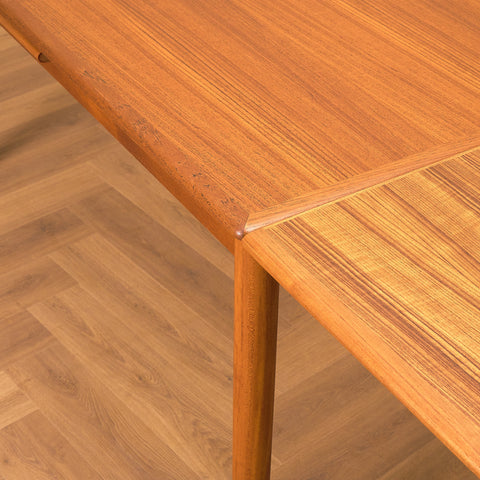 Danish dining table in teak by Arne Vodder