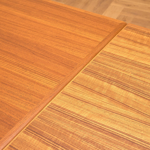 Danish dining table in teak by Arne Vodder