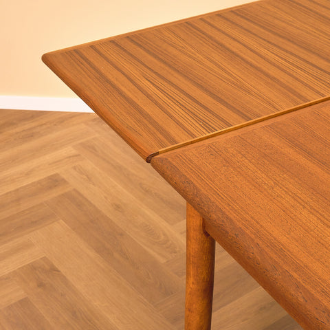 Danish dining table in teak by Arne Vodder