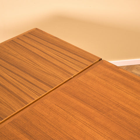 Danish dining table in teak by Arne Vodder