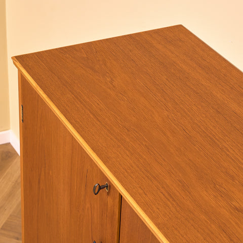 Swedish highboard in teak by Hugo Troeds, Bjärnum