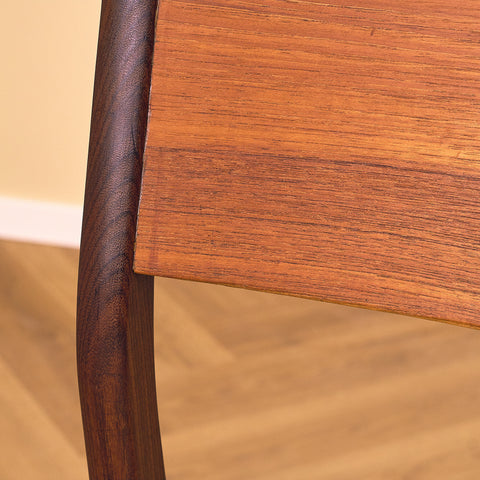 Danish dining chairs in teak and walnut