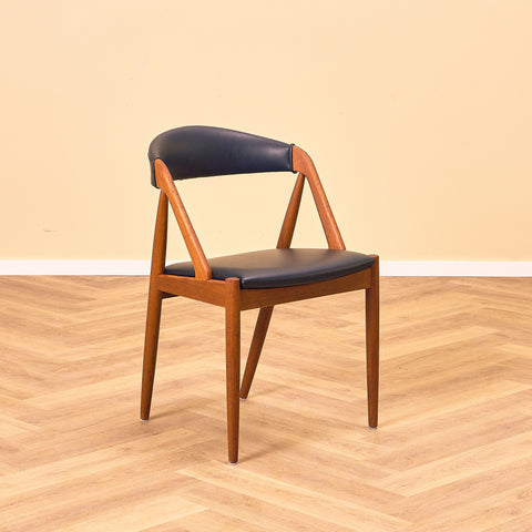 Danish dining chairs in teak by Kai Kristiansen for Schou Andersen, model 31