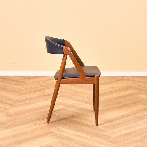 Danish dining chairs in teak by Kai Kristiansen for Schou Andersen, model 31