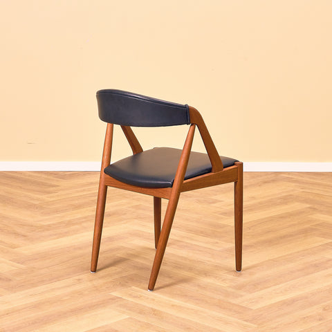 Danish dining chairs in teak by Kai Kristiansen for Schou Andersen, model 31