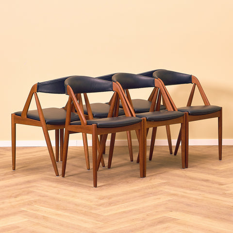 Danish dining chairs in teak by Kai Kristiansen for Schou Andersen, model 31