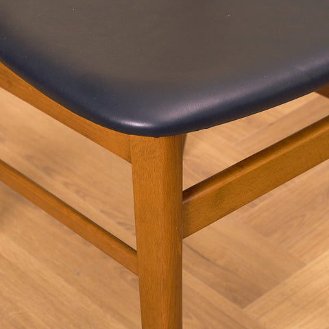 Dining chairs in teak & beech by Farstrup, model 210