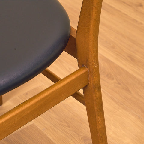Dining chairs in teak & beech by Farstrup, model 210