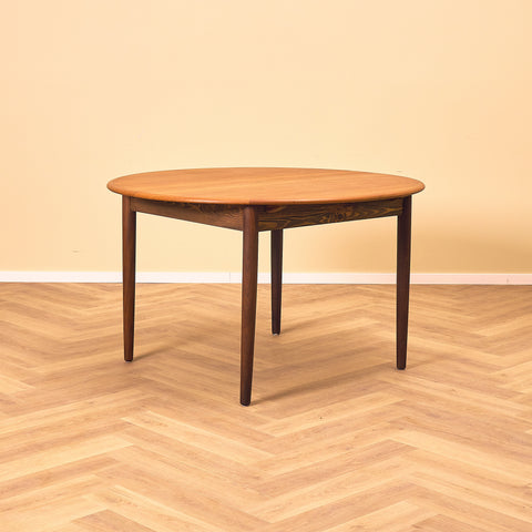 Danish round dining table in teak