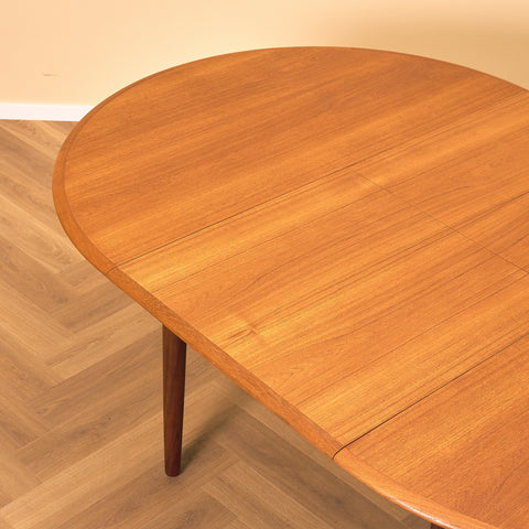 Danish round dining table in teak