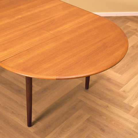 Danish round dining table in teak