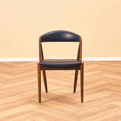 Danish dining chairs in Santos rosewood by Kai Kristiansen for Schou Andersen, model 31