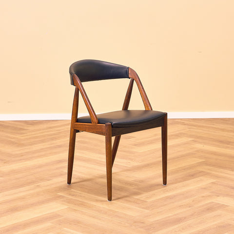 Danish dining chairs in Santos rosewood by Kai Kristiansen for Schou Andersen, model 31