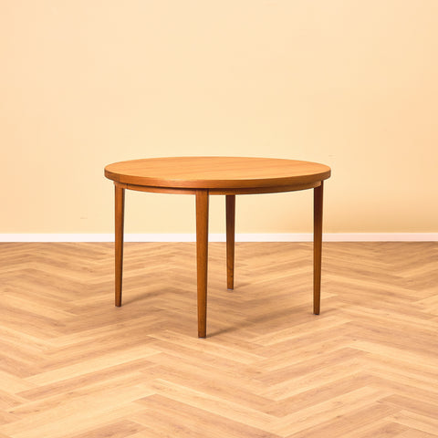 Danish round dining table in teak