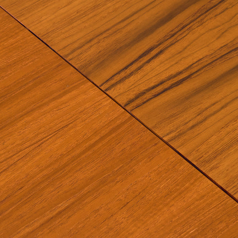 Danish dining table in teak and oak