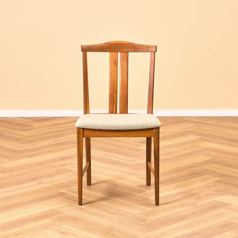 Swedish dining chairs in walnut by Karl Erik Ekselius