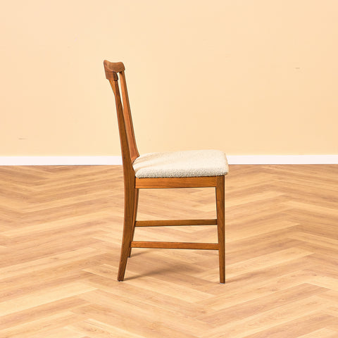 Swedish dining chairs in walnut by Karl Erik Ekselius