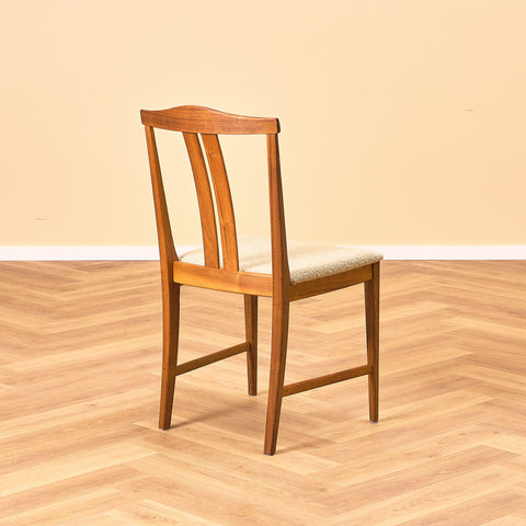 Swedish dining chairs in walnut by Karl Erik Ekselius
