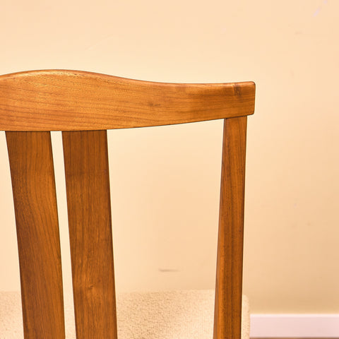 Swedish dining chairs in walnut by Karl Erik Ekselius