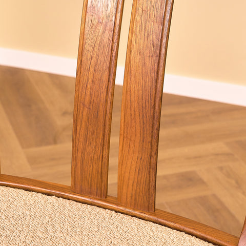 Swedish dining chairs in walnut by Karl Erik Ekselius