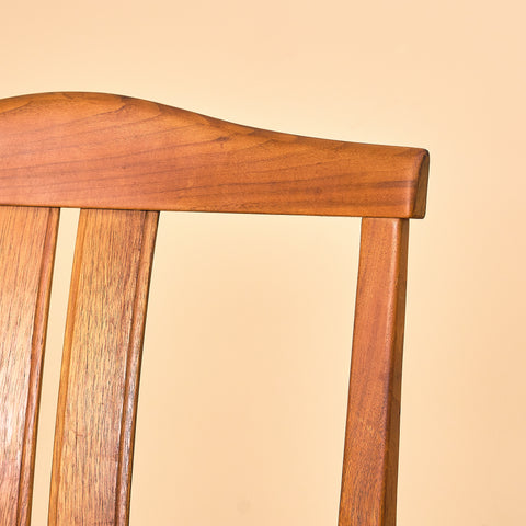 Swedish dining chairs in walnut by Karl Erik Ekselius
