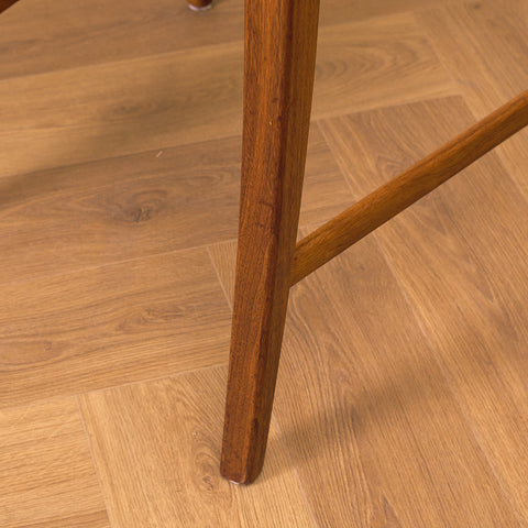 Swedish dining chairs in walnut by Karl Erik Ekselius