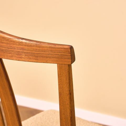 Swedish dining chairs in walnut by Karl Erik Ekselius
