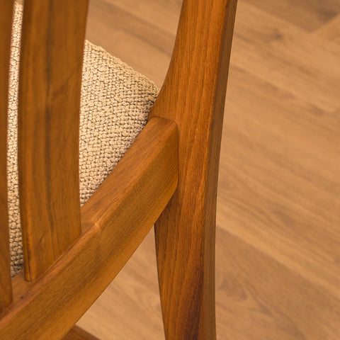 Swedish dining chairs in walnut by Karl Erik Ekselius