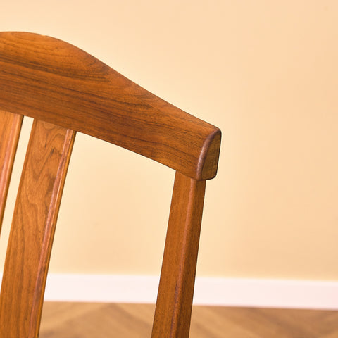 Swedish dining chairs in walnut by Karl Erik Ekselius