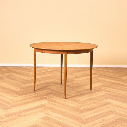 Swedish round dining table in teak and beech