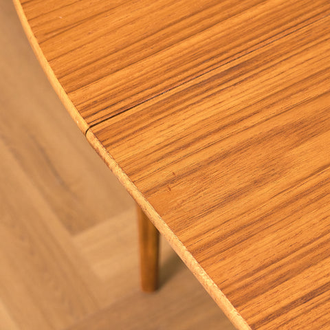 Swedish round dining table in teak and beech