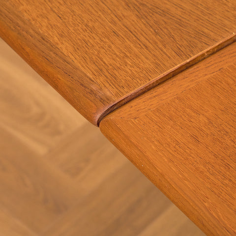 Danish dining table in teak and walnut