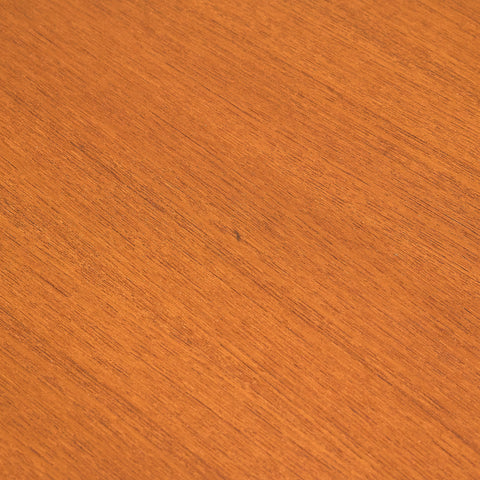 Danish dining table in teak and walnut