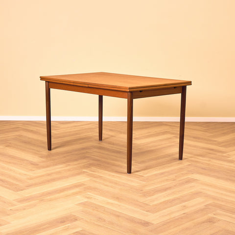 Danish dining table in teak and walnut