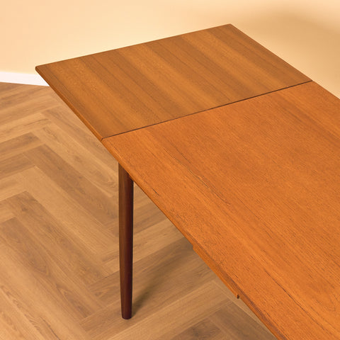 Danish dining table in teak and walnut