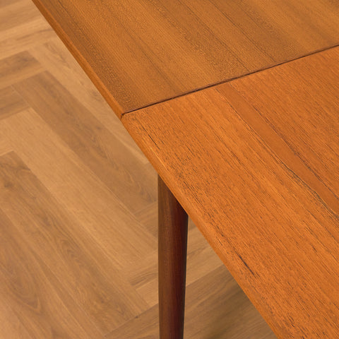 Danish dining table in teak and walnut