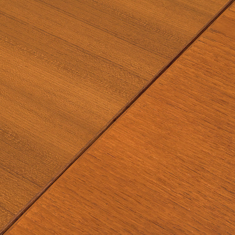Danish dining table in teak and walnut