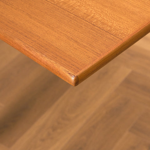 Danish dining table in teak and walnut
