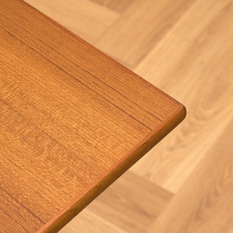 Danish dining table in teak and walnut