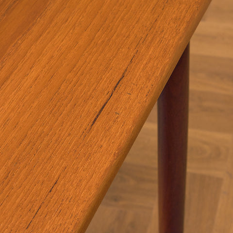 Danish dining table in teak and walnut