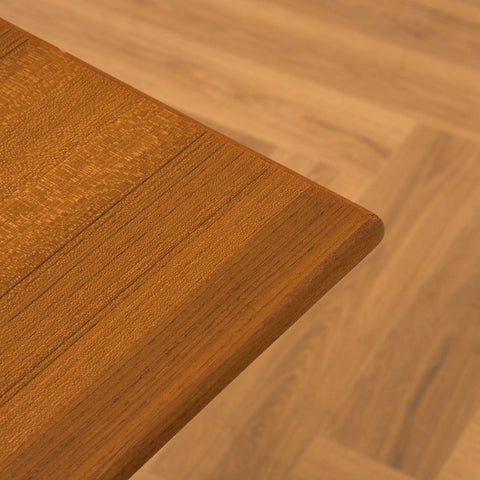 Danish dining table in teak and walnut