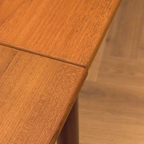 Danish dining table in teak and walnut