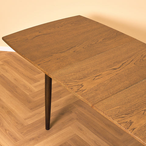 Danish dining table in stained oak